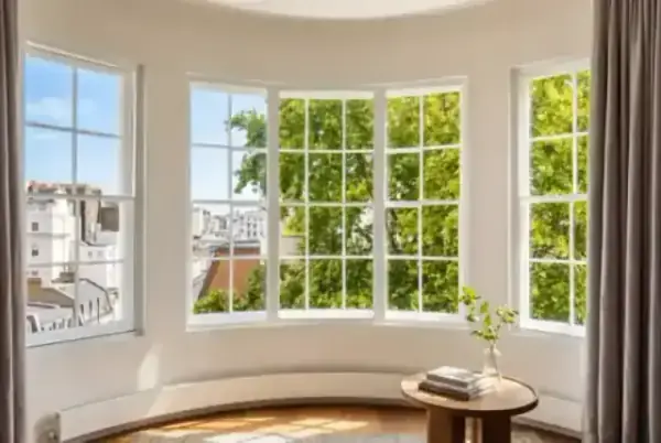 Elegant curved bay window showcasing how secondary glazing fits unique shapes