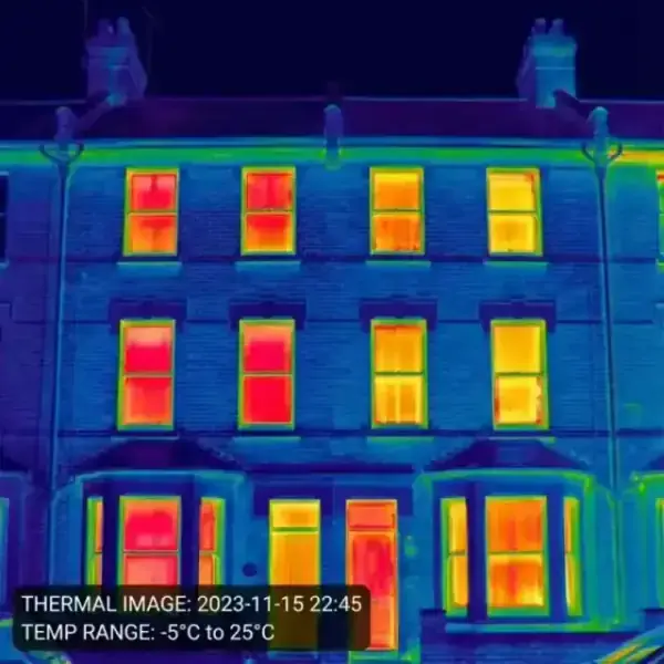 Secondary glazing specification helping to reduce heat loss through an original window